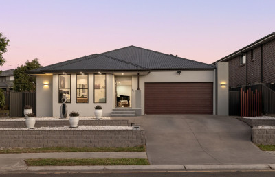 Modern Elegance with Premium Features !! Where Style Meets Smart Living - High-Spec Family Home in Prime Macarthur Heights