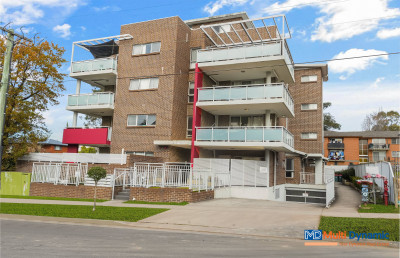 Investor's delight - modern 2-bedroom apartment with a spacious L-shaped balcony.